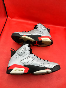 Reflection of Champion 6s size 8