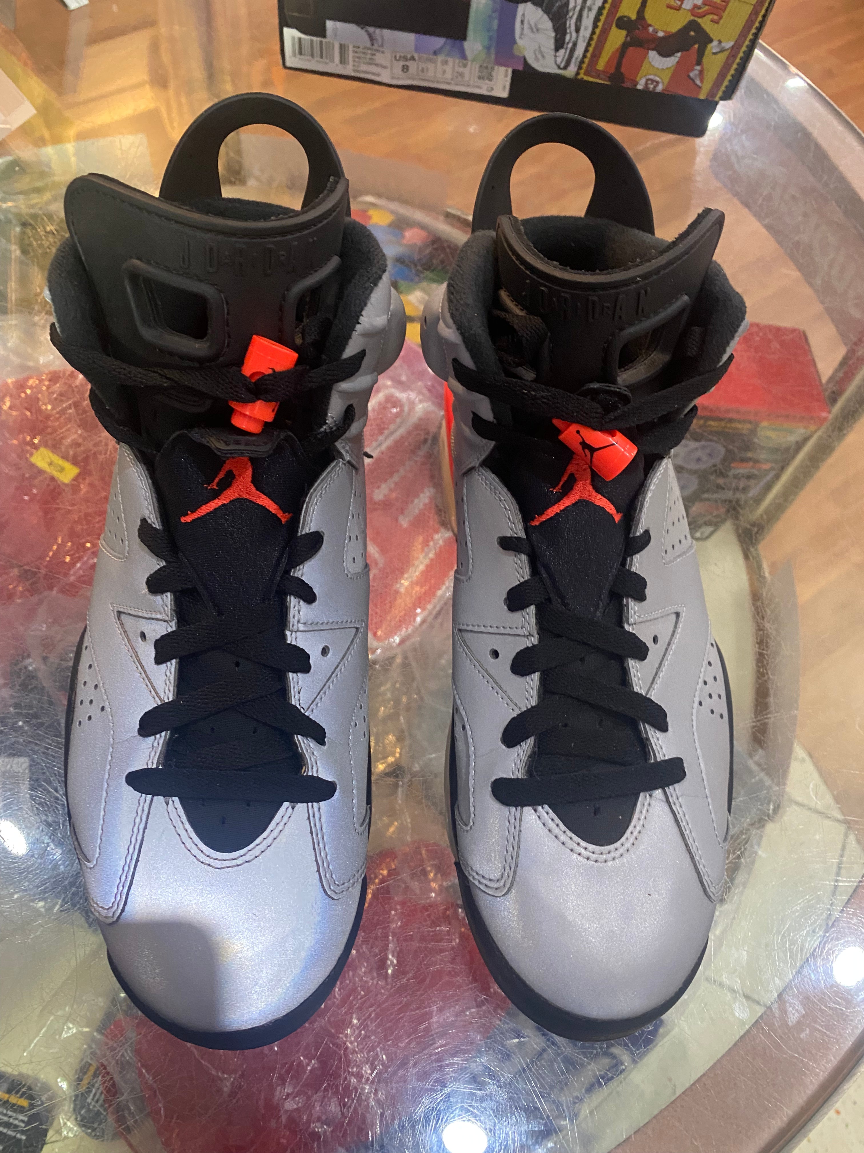 Reflection of Champion 6s size 8